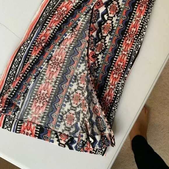 Tribal Jeans. Boho pants with slits at ankle and tassel at waist line. - Picture 2 of 4